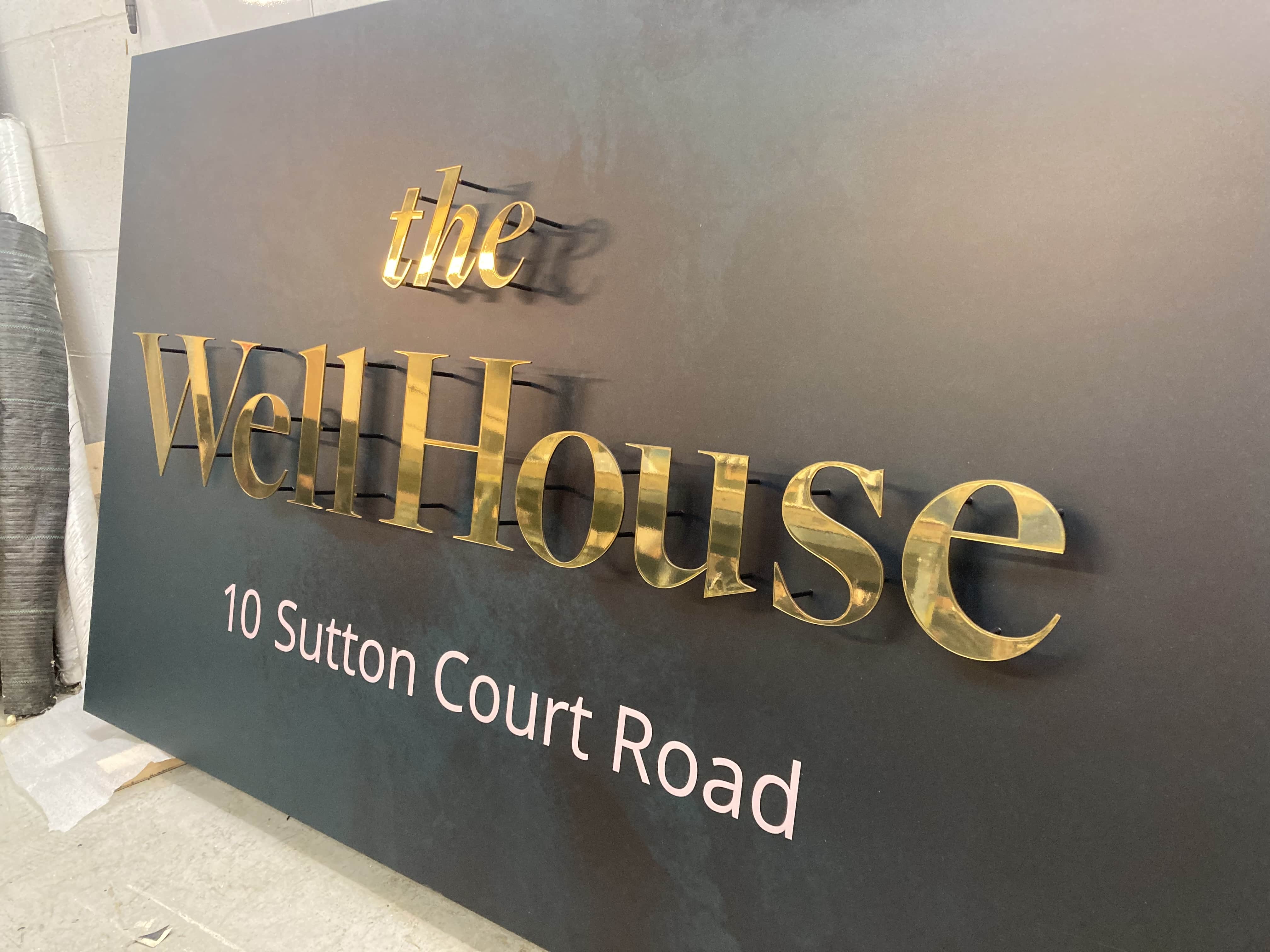 A sign for the Well House