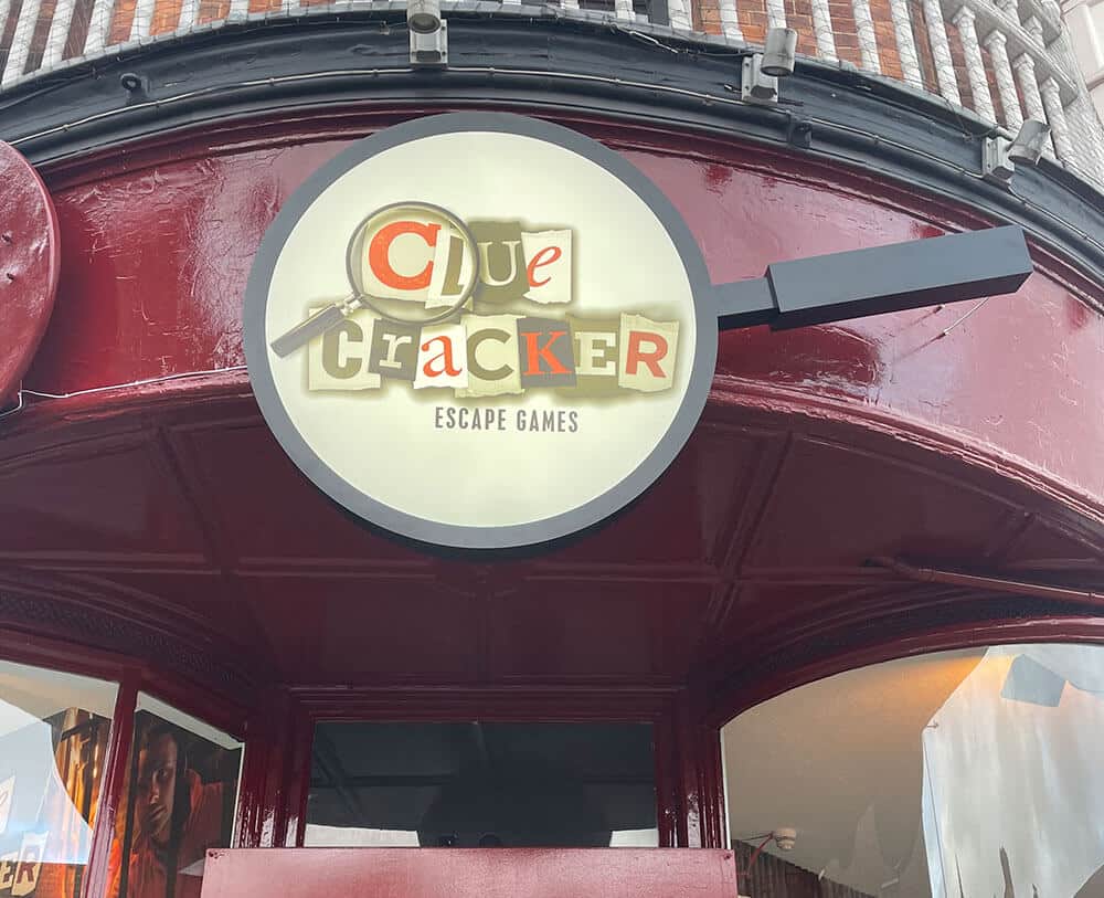 Clue cracker game shop sign